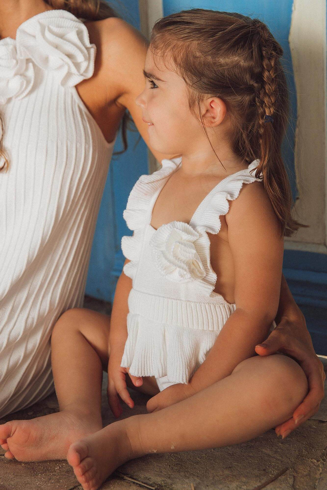 Body de tricot para bebês, na cor branca da Lili Sampedro