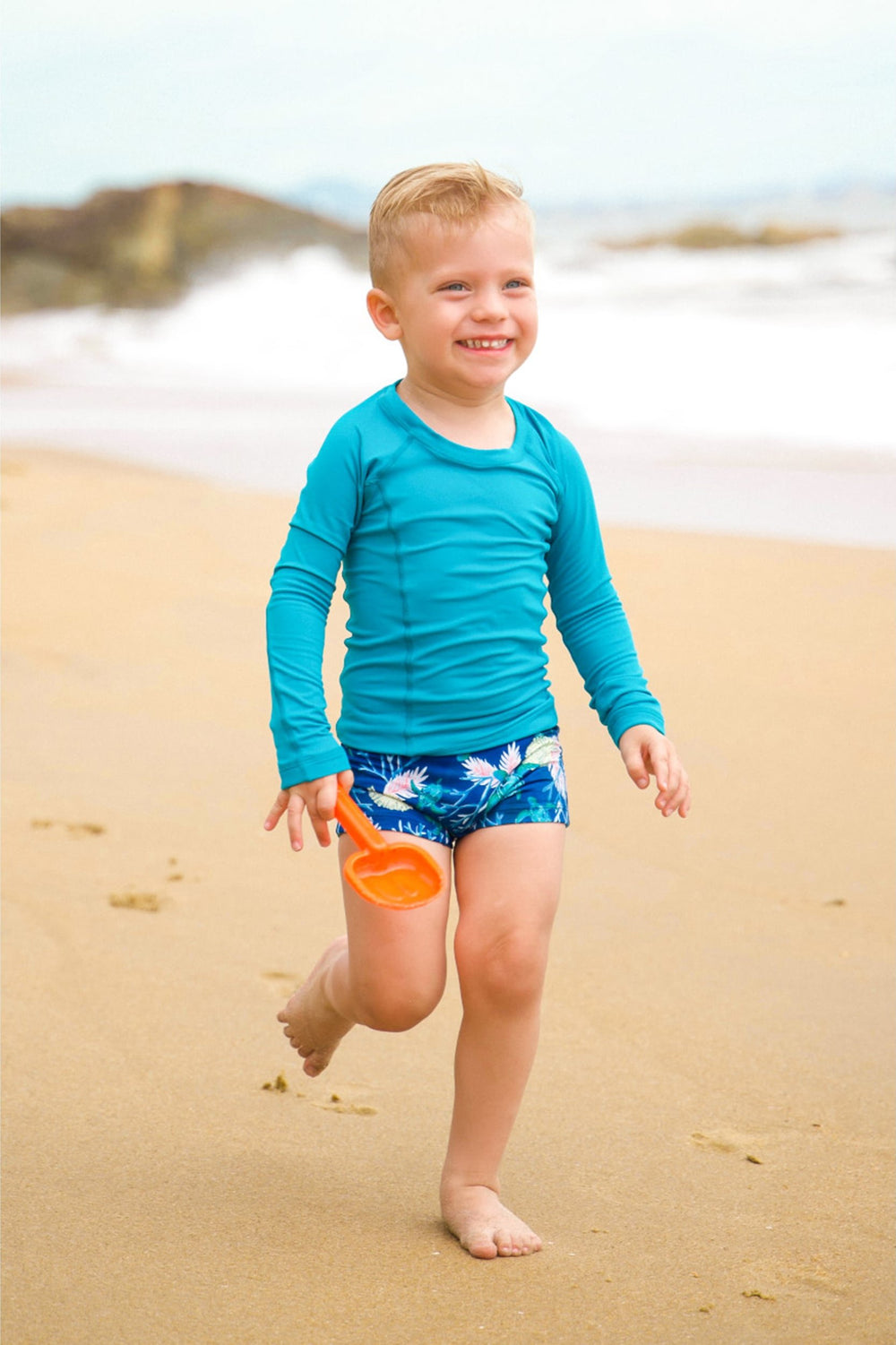 Sunguinha Infantil de Praia Masculina na Estampa Tartaruga Azul Marinho da Lili Sampedro